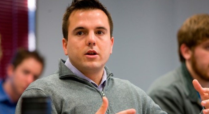 Student asking questions in class. 