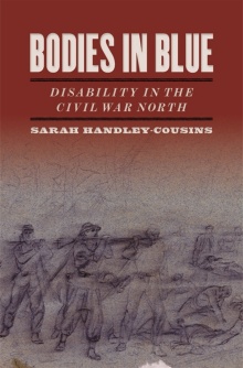 Book cover of pencil drawing of standing and fallen soldiers. 