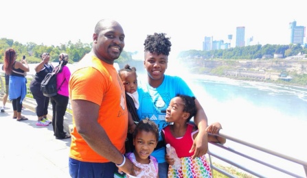 Ogechukwu Williams, Associate Professor, at Niagara Falls State Park with her family. 