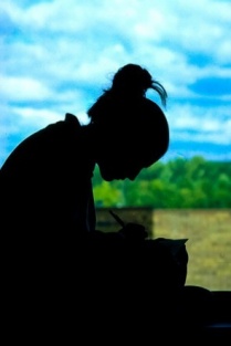 silhouette of student studying. 