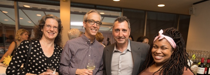 Photo of 4 people at a reception. Pictured are Victoria Wolcott, Erik Seeman (former Humanities Institute Director), David Castillo (former Humanities Institute Director), and Angie Thomas (author of The Hate U Give). 