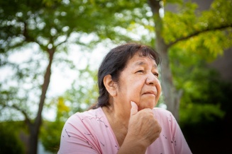 A portrait of Marilyn Schindler, a member of the Seneca Nation and a lecturer at UB in the 1970s, taken in August 2020 outside Clemens Hall on North Campus. Schindler helped to create the Native American Studies Program at the university and she recently received a doctorate in American studies from UB. 