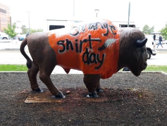 Zoom image: Bull statue painted for Orange Shirt Day 