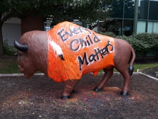 Zoom image: Bull statue painted for Orange Shirt Day, Every Child Matters