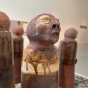 Group of four sculptures from the "Thinking in Indian" art exhibit. 