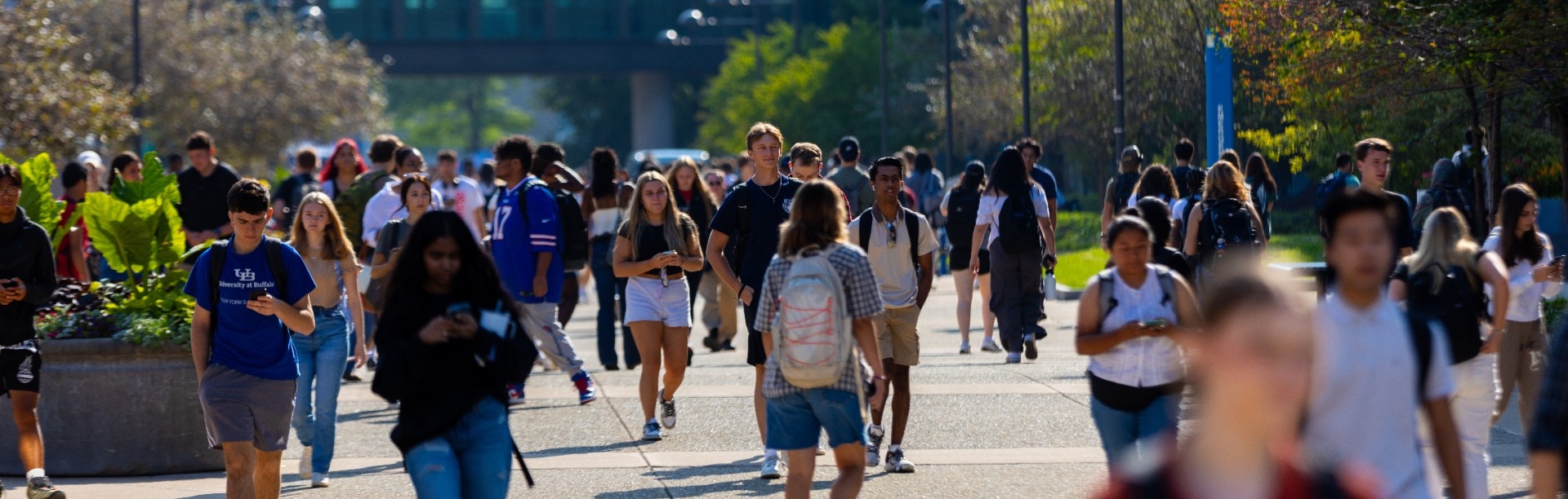 Students walk along the Promenade on UB&rsquo;s North Campus on the first day of fall semester classes. 