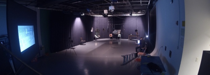 Wide shot of studio. 