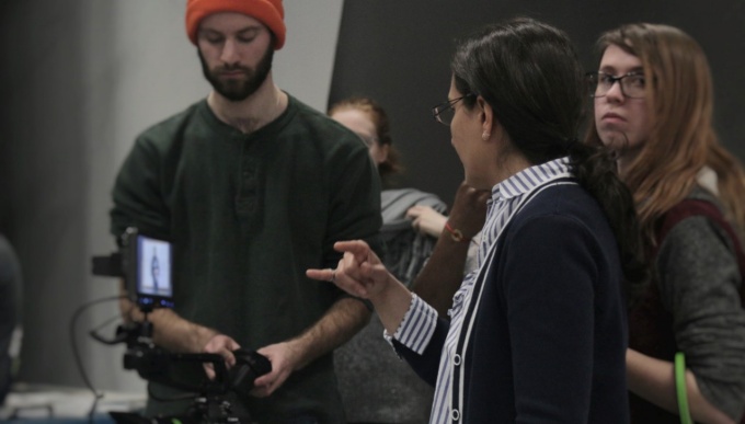 Students setting up a film shoot. 