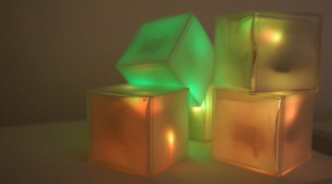 Lighted cubes stacked. 