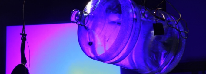 Color projection through water jug. 