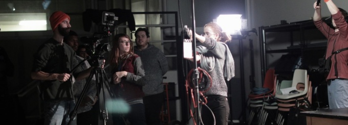 Students setting up a film shoot. 