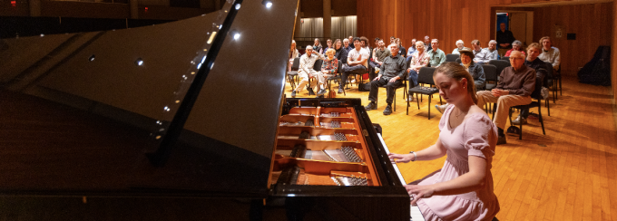 Music performance student Aria McKee plays the new B&ouml;sendorfer piano. 