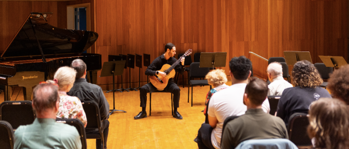 A Brown Bag Concert, a regular series showcasing the students and faculty in the Department of Music, held on the stage in Lippes Concert Hall in Slee Hall. 