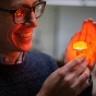 Timothy Cook, assistant professor of chemistry, served as a judge in the competition. "I'm a photochemist," he said. All things are made better with light." Photo: Douglas Levere. 