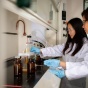 Chemistry professor Diana Aga and chemistry PhD candidate Luisa Angeles in the lab. 