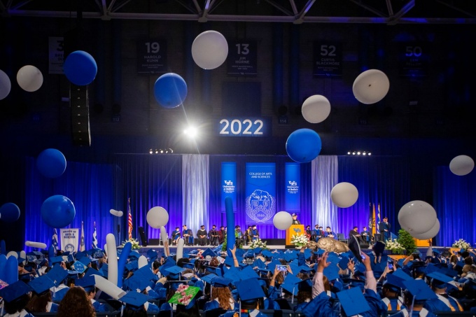 balloons falling at alumni arena for 2022 commencement ceremony. 