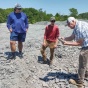 James Hanna, Jonathan Hoag and Carlton E. Brett examine rocks at Penn Dixie Fossil Park and Nature Reserve in May. 