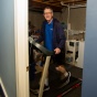 Joe Syracuse walks on a treadmill. 