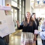 Alyssa Warrior presents her research during the RNEW Institute's spring poster session and celebration. 