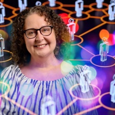 Shira Gabriel, a network of interconnected human figures in the background. 