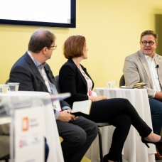 Dean Jeff Grabill and speakers at the AI Summit. 
