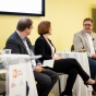 Dean Jeff Grabill and speakers at the AI Summit. 