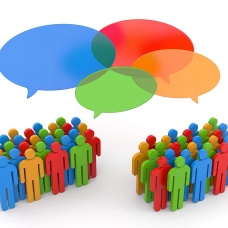 Concept of civil discourse featuring two groups of figures with overlapping translucent speech bubbles. 