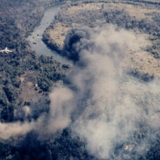 A U.S. Air Force North American F-100D Super Sabre in flight over a target in South Vietnam. 
