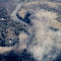 A U.S. Air Force North American F-100D Super Sabre in flight over a target in South Vietnam. 