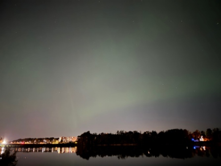 The photo was taken in front of the UB's Lake LaSalle on October 10, 2024, at around 9 p.m. when green light was visible. 