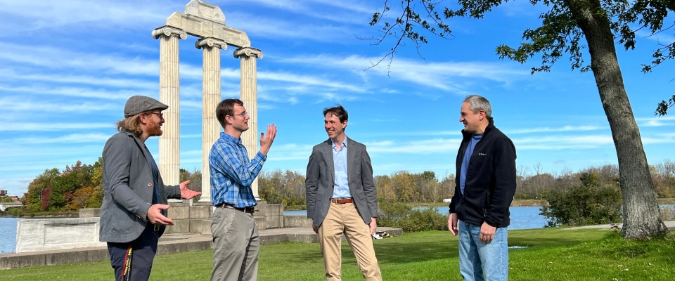 New physics faculty (from leftto right), Tim Thomay, Grady Gambrel, Bendikt Harrer, and Jan-Christopher Winter, enjoying some nice weather at Baird Point on North Campus. 