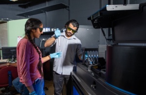 Students preforming tests in lab.