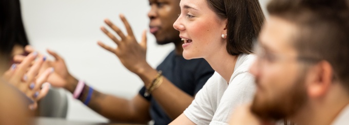 Students participate in an ice breaker activity. 