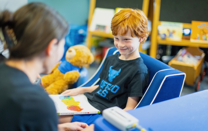 Graduate student in Dr. Jamie Ostrov's lab with child participant. 