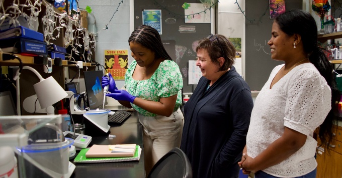 Professor Ann-Marie Torregrossa, PhD, (center) with students and lab personnel. 