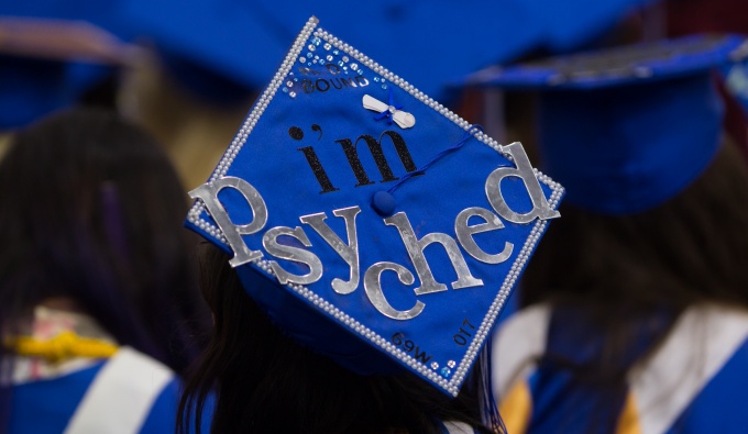 Grad cap reading "I'm Psyched!". 