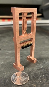Zoom image: Chip Holder created for low temperature experiments performed in a cryostat by the Physics Department. 