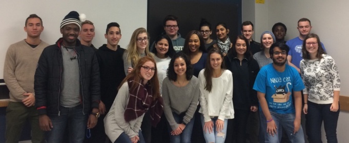 TA Ashley Byczkowksi (first row right) and her French 213 class. 