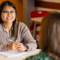 Student getting hands-on experience in an office. 