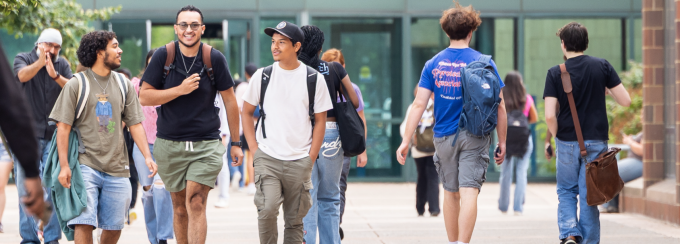 Students walking in UB campus. 