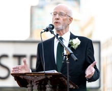 Professor Vincent O'Neill at a podium. 