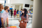 The College of Arts and Sciences (CAS) hosts new students for Academics Day as part of Welcome Weekend at the Center for the Arts in late August 2021. In the Atrium, students could visit with various departments to ask questions and talk about the programs. Photographer: Douglas Levere