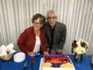 Sarah and Jorge pose with their cake.
