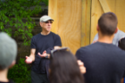 Ed Steinfeld, professor of architecture and director of the Center for Inclusive Design and Environmental Access (IDeA Center) at the University at Buffalo, talks with students at a Habitat for Humanity house in Buffalo. The home was designed by UB students.