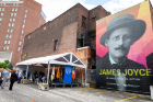 UB held a news conference on June 14 to introduce a new mural of renowned author and poet James Joyce in downtown Buffalo. Photographer: Meredith Forrest Kulwicki