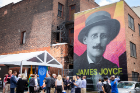 UB held a news conference on June 14 to introduce a new mural of renowned author and poet James Joyce in downtown Buffalo. Photographer: Meredith Forrest Kulwicki