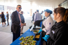 A. Scott Weber, vice president for student life, decides which of the culinary offerings he'd like to try.