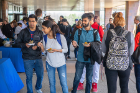 UB students sample some of the international dishes available at the event.