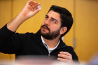 Demetrius Vazquez, a PhD student at the University of Central Florida, inspects a crystal. Vazquez was one of three judges who flew into Buffalo from out of town. Researchers at the University of Central Florida, Georgetown University and Texas A&M University serve as regional coordinators for the contest. Photo: Douglas Levere